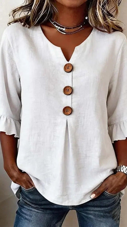 Carla |Blusa con botones y volantes.