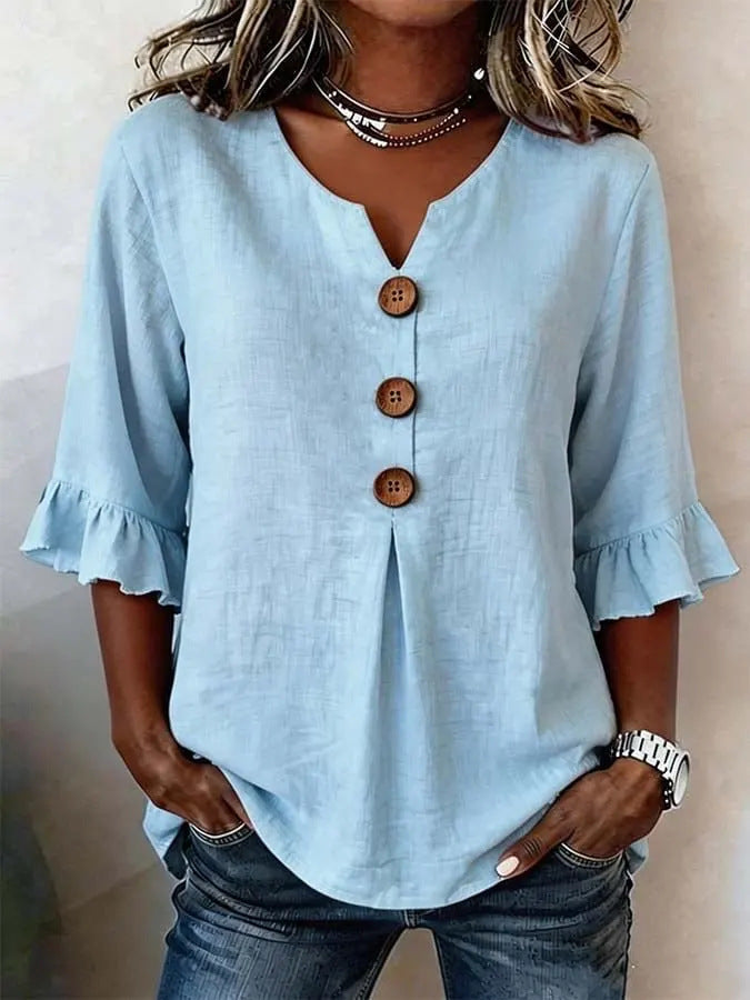 Carla |Blusa con botones y volantes.