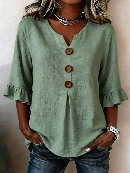 Carla |Blusa con botones y volantes.
