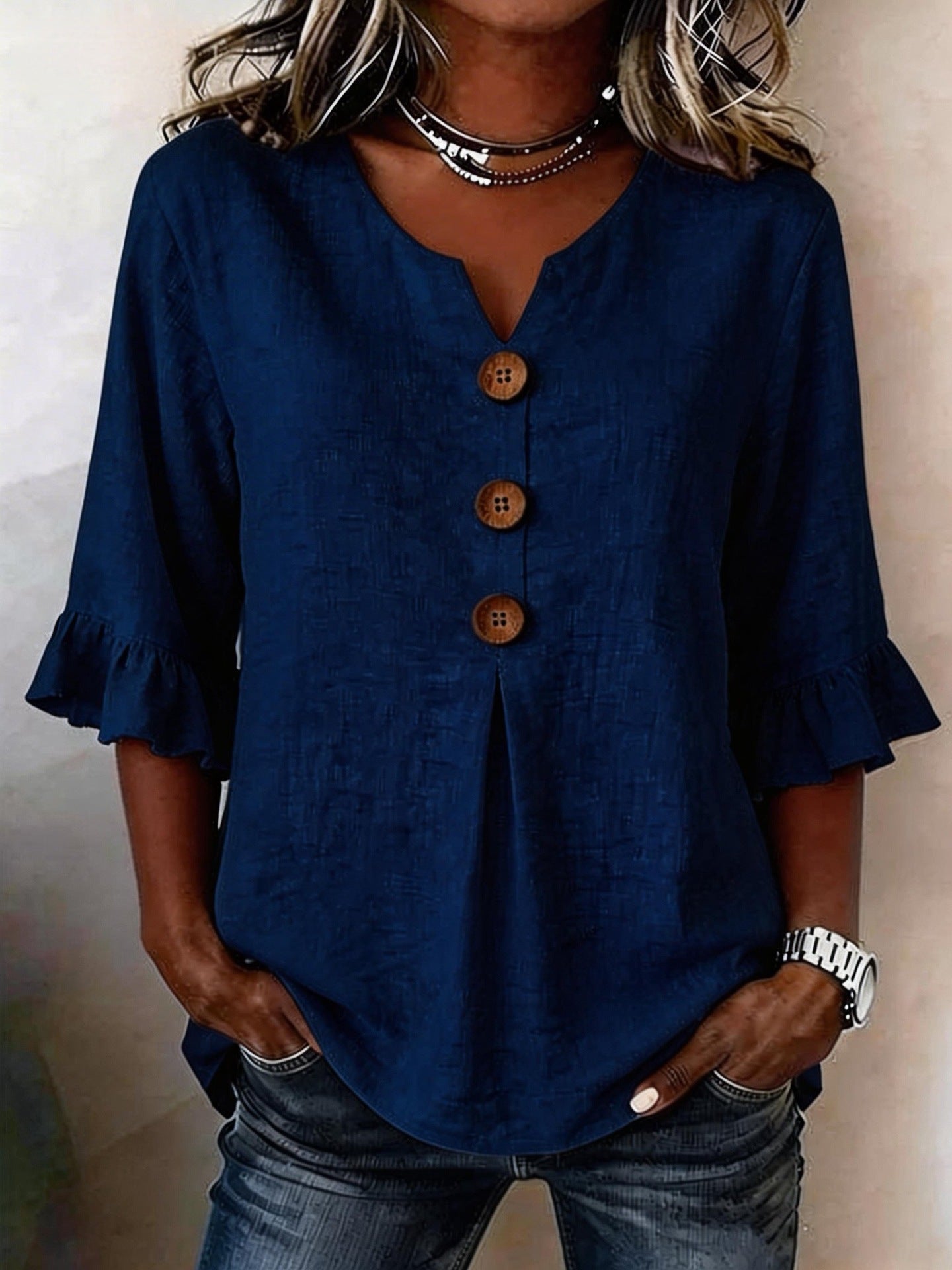 Carla |Blusa con botones y volantes.