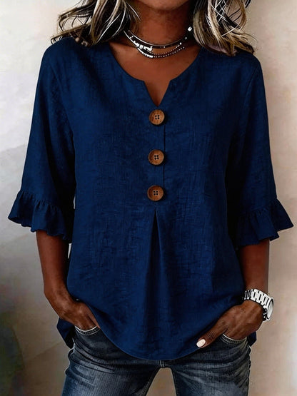 Carla |Blusa con botones y volantes.